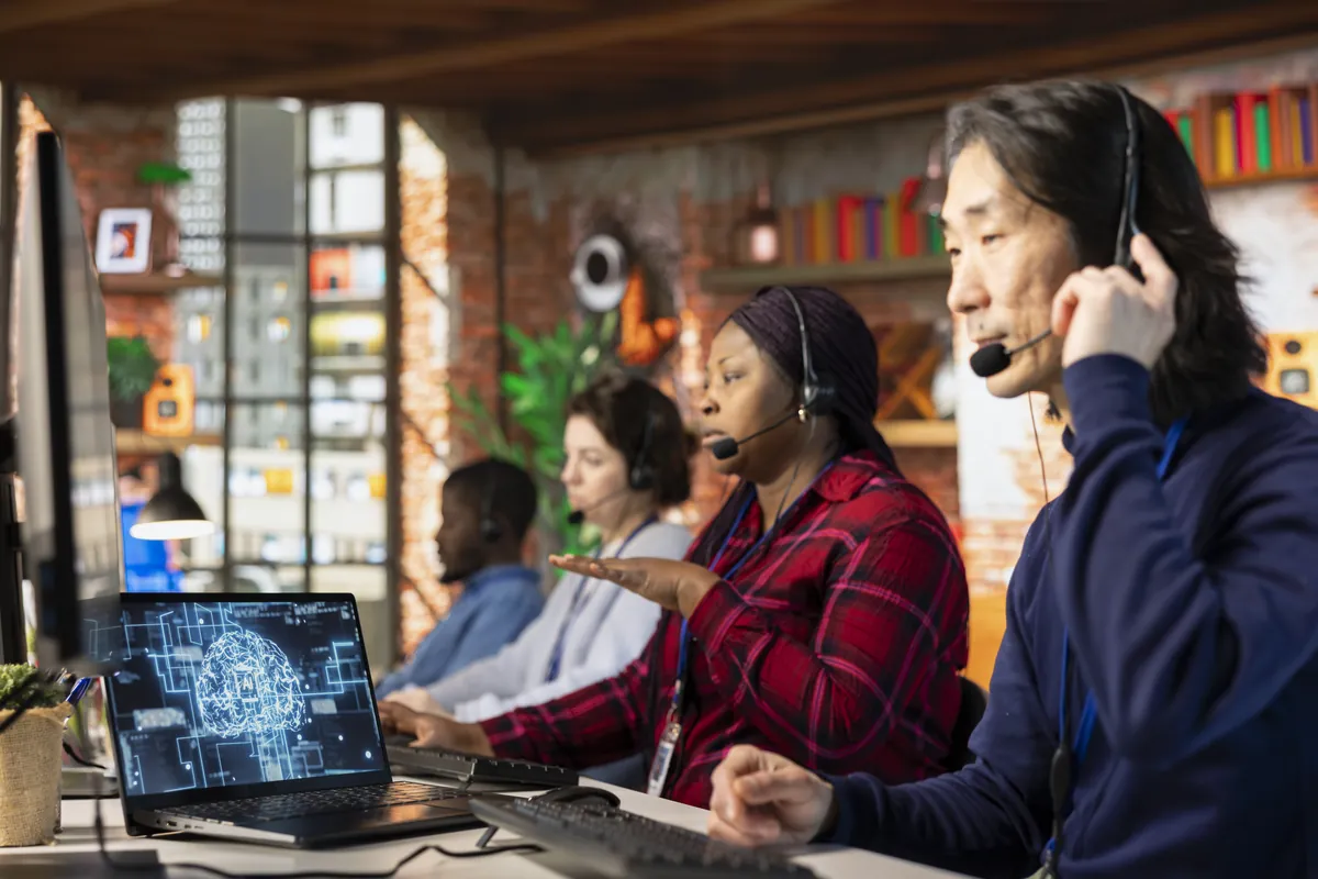 Customer support team replying to customers with help from an AI chatbot