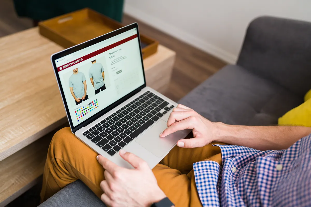 Shopper browsing an ecommerce product page on a laptop
