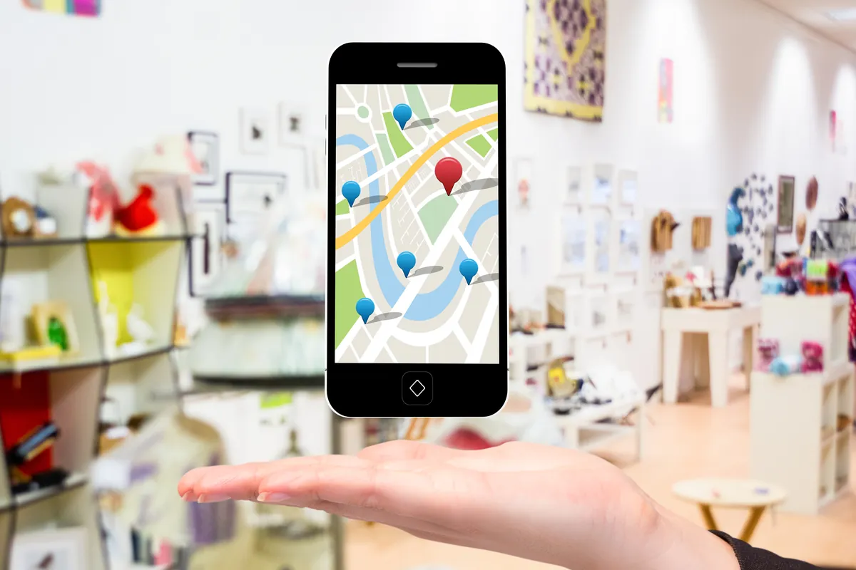 Smartphone showing Google Maps local search results with business location pins