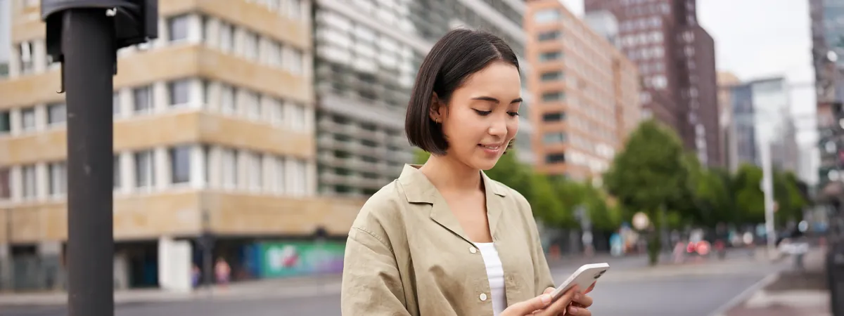 Shopper in Singapore searching for a nearby business on her phone