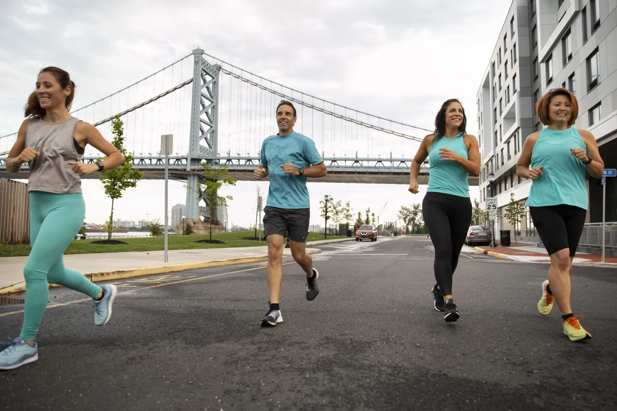 Group of runners on a city road